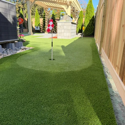 Upstate NY backyard putting green by Upstate Turf Co